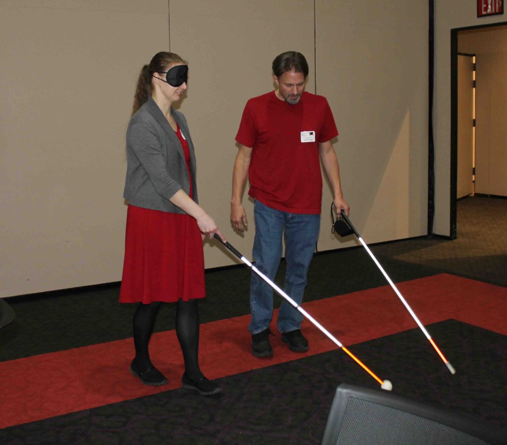 Husband and wife learning how to use a cane